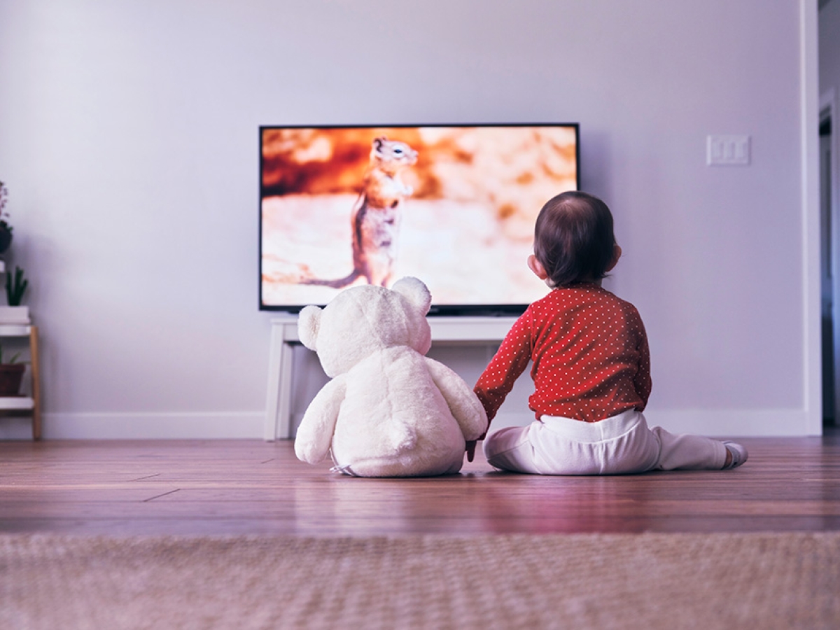 Baby in front of tv