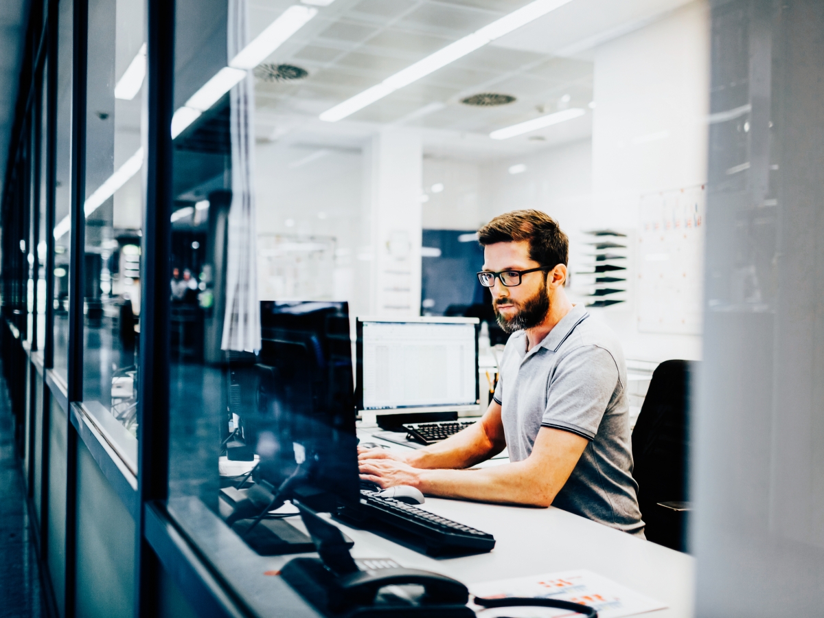 Man-Working-on-Computer