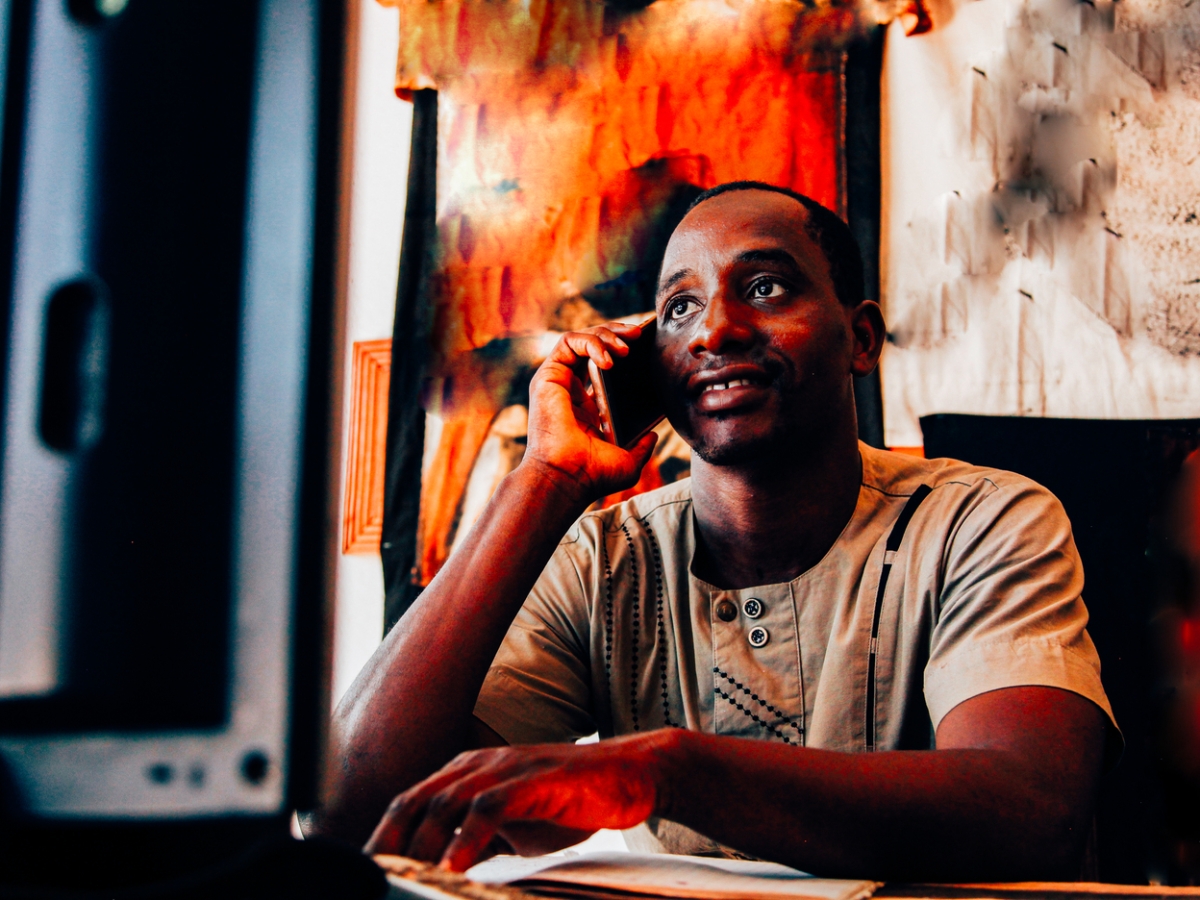 man in Mali using cellphone