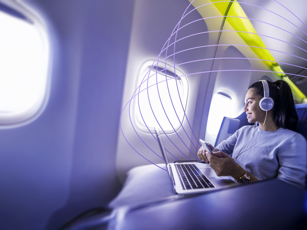 passenger on plane using wi-fi