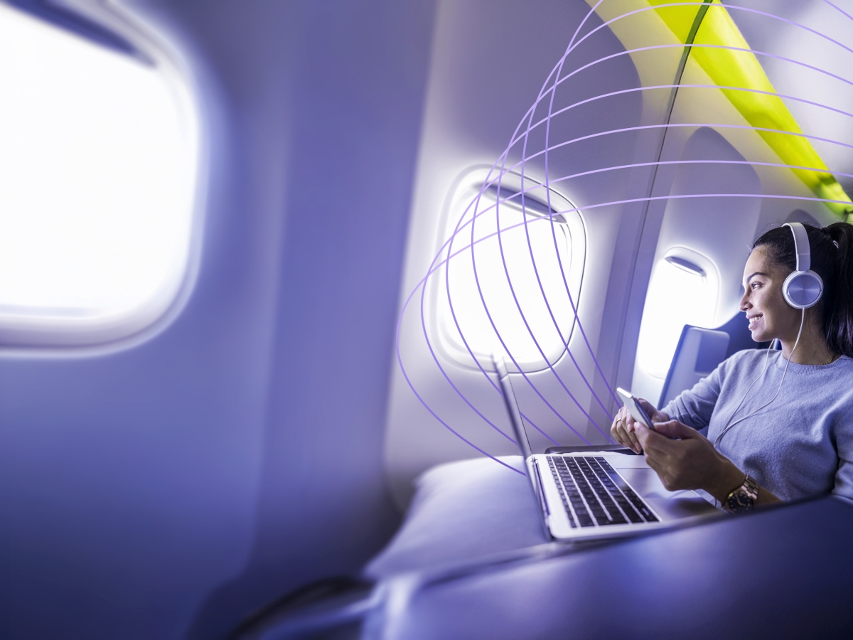 passenger on plane using wi-fi