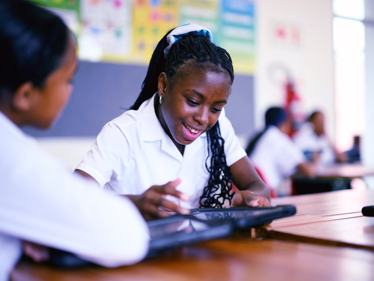 African Schoolgirls working on tablet