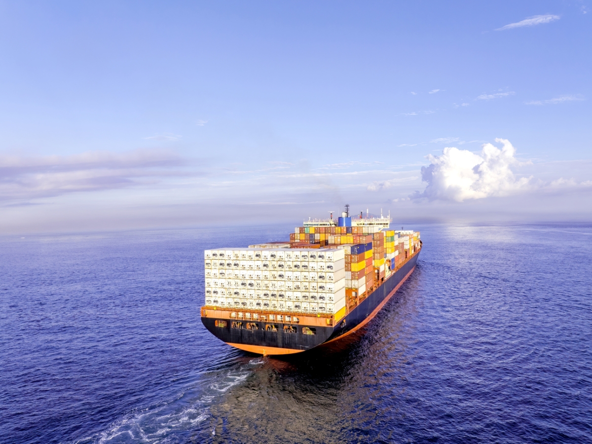 Image of a cargo ship carrying goods on the sea