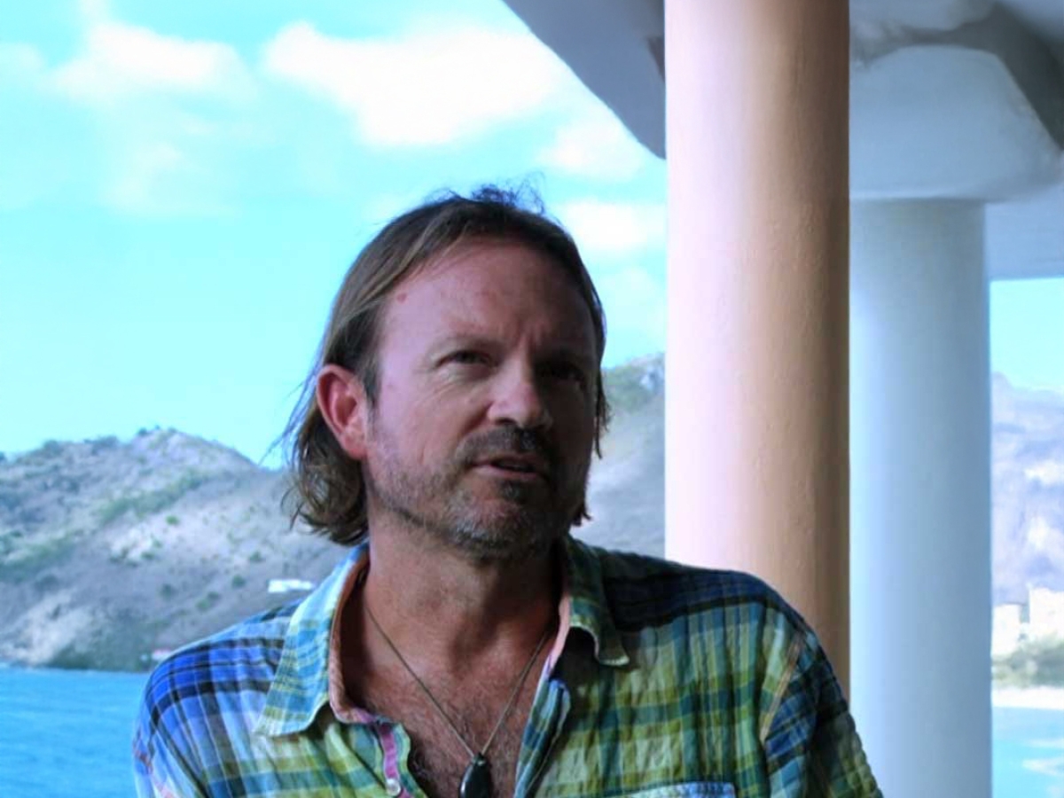 Image of Marc standing with beach in the background
